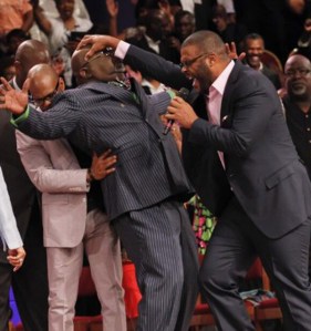 FalseProphetsTylerPerryLayHandsOnTDJakesAndFillHimWithTheHolyGhostThenTDJakesFallsOutVideoInside